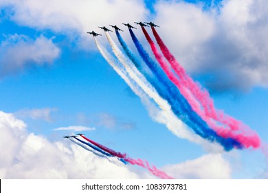 Russia, Moscow, May 2015. The Group Of Planes Produces Smokes In Honor Of A Victory Day