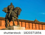 Russia, Moscow region, Kolomna - monument to Dmitry Donskoy at the walls of the Kolomna Kremlin at sunset. Sight. Business card of the city of Kolomna.