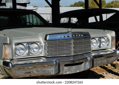 Russia, Moscow - September 2022. Old Retro Vintage Chrysler Gray Of The 20th Century Stands Outside Under A Canopy At The Car Show. Chrome Shiny Bumper. Front View.