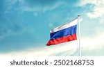 Russia national flag fluttering. The flag blowing in beautiful soft sky. Russia national flag for independence day.