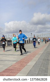 Russia, Novosibirsk - December 14, 2019: Spring Run on the Quay. group of people participate in a sports event - Shutterstock ID 1375862828