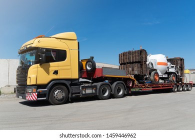 Russia, Omsk, July 18, 2019. Oversized heavy transportations by truck. High industrial cargo shipped on the trawl.