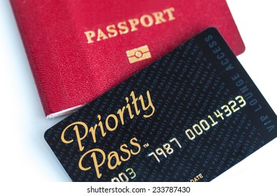 RUSSIA, OREL - 27 NOVEMBER 2014: Priority Pass Card (card For VIP Lounge Access) And International Passport. Travel Concept. White Background