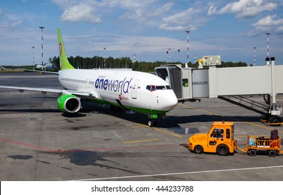 RUSSIA, SAINT-PETERSBURG, INTERNATIONAL AIRPORT PULKOVO - 17 JUNE 2016: Airplane Boeing 737-800 Of S7 Airlines, Member Of One World Alliance Is Ready For Boarding Passengers