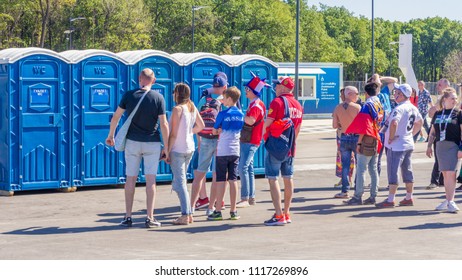 Russia, Samara, June 2018: football fans are waiting in line for a public toilet during a soccer match of Serbia Costa Rica at the World Championships near the stadium of Samara Arena.