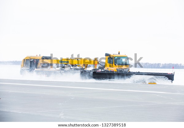 Russia, snow removal on the territory, runway,\
apron, Ufa airport\
2019.02.21