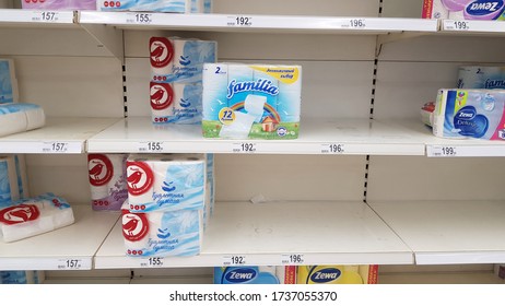 Russia, St. Petersburg 15.03.2020 Half Empty Shelves With Toilet Paper Due To Coronovirus In A Supermarket