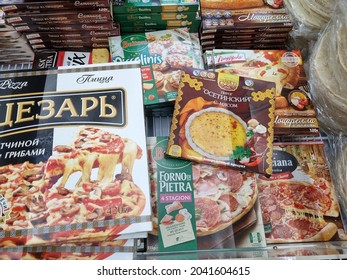 Russia, St. Petersburg 26,08,2021 Packages With Frozen Pizza In A Supermarket