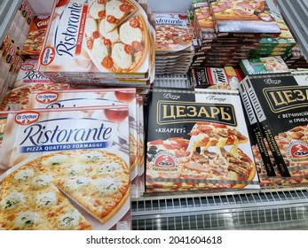 Russia, St. Petersburg 26,08,2021 Packages With Frozen Pizza In A Supermarket