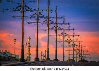 Russia. Sunset In Saint Petersburg.Tram Pillars Of The Trinity Bridge. Streets Of St.Petersburg. Trinity Bridge Without Cars.Road Architecture Of The Russian Federation.Design Of Tram Poles In Russia.