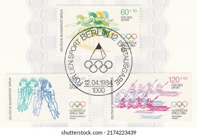 RUSSIA - TOPKI, July 3, 2022: stamp printed in Germany, shows Women's Hurdles, road cycling, kayak four. Summer Olympic Games, Los Angeles, circa 1984