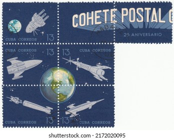 RUSSIA - TOPKI, June 27, 2022: stamp printed in Cuba, shows Earth, rockets and satellites. First post rocket experiment in Cuba, circa 1964