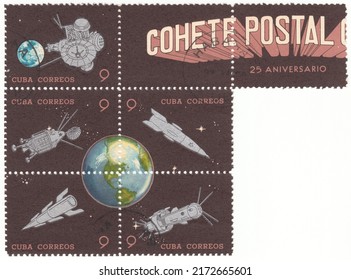 RUSSIA - TOPKI, June 29, 2022: stamp printed in Cuba, shows Earth, rockets and satellites. First post rocket experiment in Cuba, circa 1964