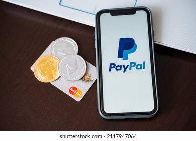 Russia Ufa February 2022: Cryptocurrency Exchange Through Mastercard And Paypal Payment Systems. Crypto World In The Phone, Blockchain Technology In Money. Plastic Card. High Quality Photo