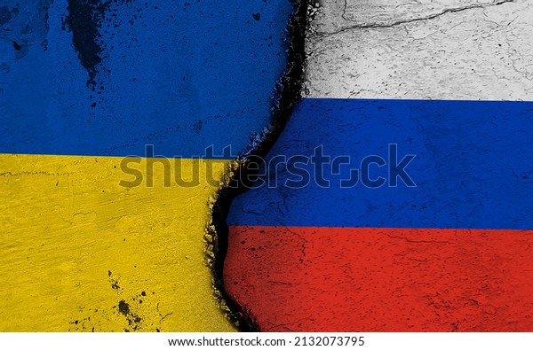 Russia\
and Ukraine flags, Russia and Ukraine flag image on cracked and\
aged background. cracked flag. Russia Ukraine\
war.