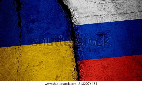 Russia and Ukraine flags, Russia and Ukraine war. \
Flag image on cracked and aged background. Russia Ukraine\
war.Cracked flags.