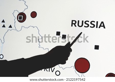 Russia and Ukraine war. Pointing on political map where Russia can invade through Ukraine border