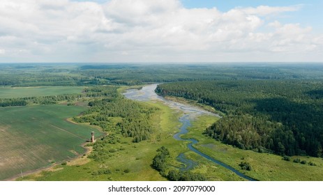 Russia, Ural. Takeoff Over Fields And Forests. Swampy Pond. Shadows On The Ground, Aerial View  