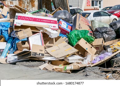 Russia, Vladivostok, 03/23/2020. Garbage Dump In Residential Area. Dirt And Stench, Environmental Issues. Mud In The Streets. City Infrastructure And Its Problems. Bad Quality Of Life.