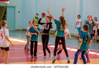 Russia, Vladivostok, 04/28/2018. Kids Play Handball Indoor. Sports And Physical Activity. Training And Sports For Children.