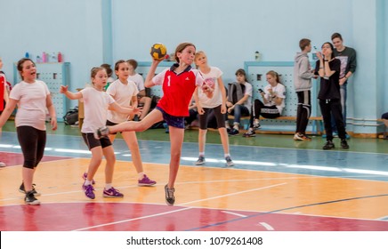 Russia, Vladivostok, 04/28/2018. Kids Play Handball Indoor. Sports And Physical Activity. Training And Sports For Children.