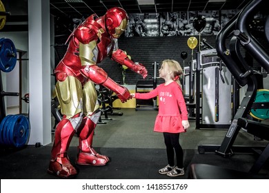 RUSSIA, YAROSLAVL - 17 NOV. 2018: Animators Iron Man And Spider Man In The Fitness Gym With Bodybuilding Equipment.