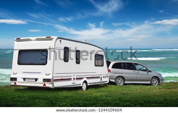 Russia. Yeisk district. The Sea of Azov\
05/02/2018  The caravan stands on the Vedic lawn by the sea. The\
family went on vacation to\
nature.