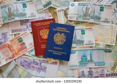 Russian Armenian Passport And Rubles  On The Background.