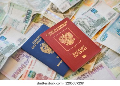 Russian Armenian Passport And Rubles  On The Background.