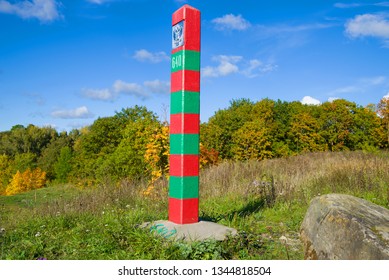 Russian Border Pillar In The Autumn Landscape On A Sunny Day.