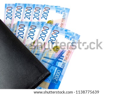 Russian cash. Banknotes in two thousand rubles. Black Man wallet. Payment
