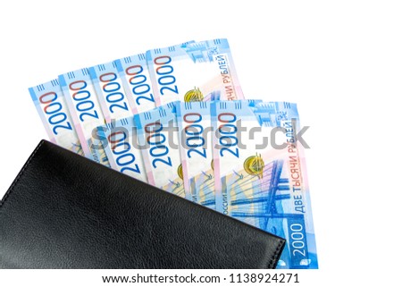 Russian cash. Banknotes in two thousand rubles. Black Man wallet. Payment