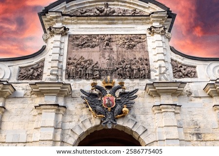 Russian coat of arms (double-headed eagle) on Petrovsky gate of the Peter and Paul Fortress in St. Petersburg, Russia (1720)