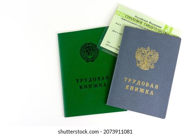 Russian documents. Work book, employment record, a document to record work experience. Translation Labor Book, Insurance Pension Certificate. Employment book of old and new samples.  - Shutterstock ID 2073911081