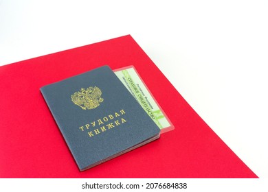 Russian documents. Work book, employment record, a document to record work experience. Translation Labor Book, Insurance Pension Certificate. On white - Shutterstock ID 2076684838