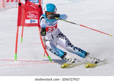 Russian Federation Alpine Skiing Championship, parallel slalom. Mountain skier Veronika Gavrish Murmansk Region skiing down mount slope. Moroznaya Mount, Kamchatka Peninsula, Russia - March 30, 2019