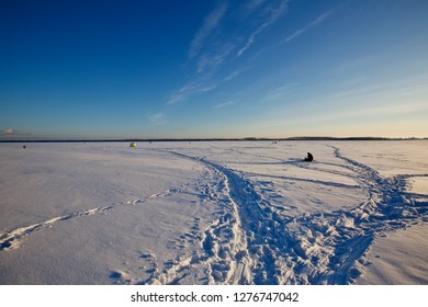 Russian Federation, Khanty-Mansi Autonomous Okrug – Yugra, Surgut, January 6, 2019: Ice Fisher's Shacks On The Frozen Body Of The Ob River, Near The City Of Surgut.