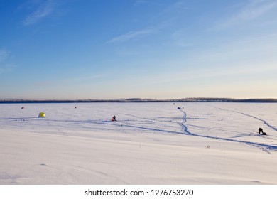 Russian Federation, Khanty-Mansi Autonomous Okrug – Yugra, Surgut, January 6, 2019: Ice Fisher's Shacks On The  Frozen Body Of The Ob River, Near The City Of Surgut.