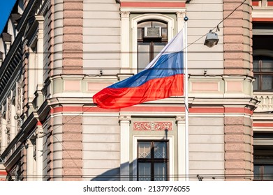Russian flag at the Russian Embassy building in Riga, Latvia - Shutterstock ID 2137976055