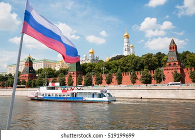 Russian Flag On The Background Of The Moscow Kremlin And Moscow River In Moscow