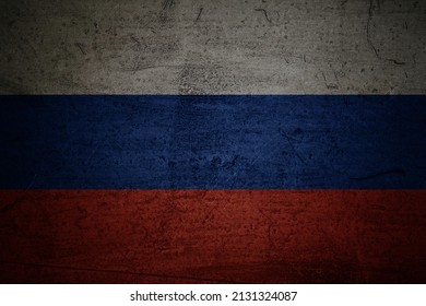 Russian flag on background wall referring to their current war with Ukraine - Shutterstock ID 2131324087