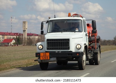 Russian Fuel Truck With ADR Sign 33-1203  On Country Road. Gasoline Delivery On Farm