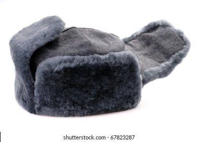 Russian Fur Hat With Ear-flaps Isolated On White