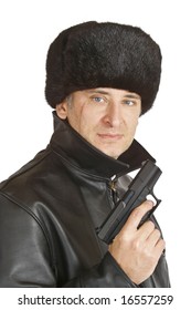 A Russian Mafia Figure With A Large Facial Scar Carrying A Hand Gun