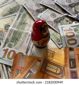 Russian Matryoshka Doll Against US Dollar And European Union Euro Currencies