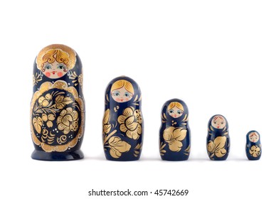 Russian Matryoshka Dolls In A Row Isolated On White