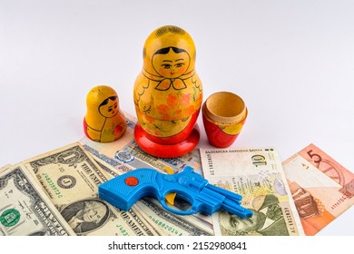 Russian Matryoshka With A Pistol And Money As A Symbol Of Mafia Aspirations And Violence.