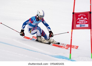 Russian Men's Alpine Skiing Championship, Giant Slalom. Mountain Skier Skiing Down Snowy Mountain Slope. Kamchatka Peninsula, Russian Federation - April 2, 2019