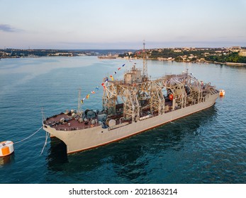 Russian Military Ship In Sevastopol Bay At Navy Day, Aerial View.