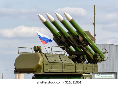 Russian Missile System Buk-M2 At MAKS, Modern Weapon Of Russian Army Forces. Surface-to-air Rockets And Russian Flag. Theme Of Military Equipment, Army And War In Ukraine. Russia - Aug 28, 2015